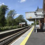 The platform and brick built station building with a wooden canopy for shelter.