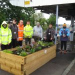 Planter at Sittingbourne Station with Sheppey College Students