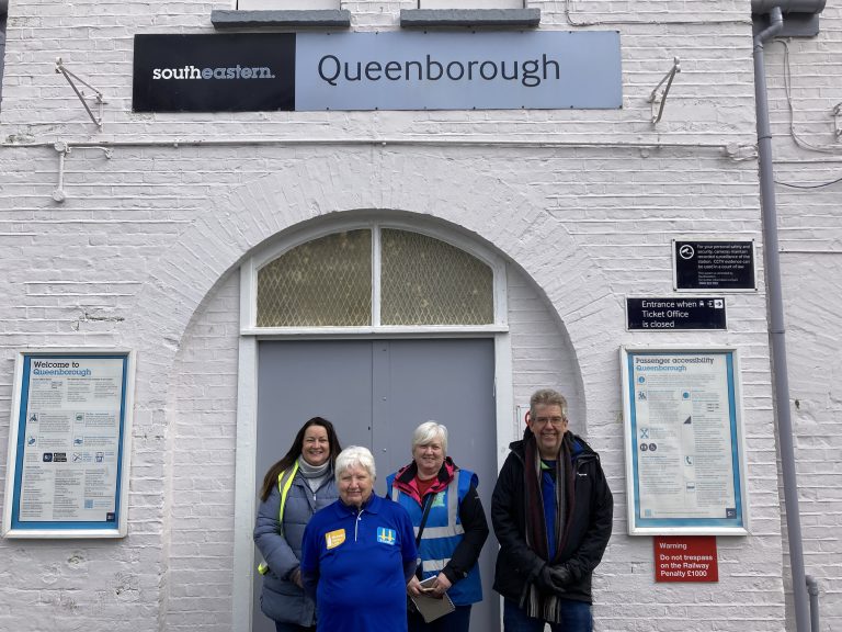 Lisa Gransden (Queenborough in Bloom), Linda Brinklow (Volunteer Chair, Swale Rail Line of Kent CRP), Paula Telford (Queenborough in Bloom), Matt Fraser (Southeastern) outside the entrance doors to Queenborough Station.