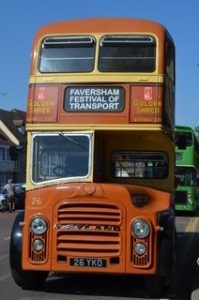 A vintage orange double decker Bus