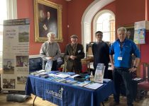 Chris, Jonathan, Dominic and Matt at our promotional stall. The table is covered with a variety of literature promoting local attractions, green tourism, rail services and Kent CRP