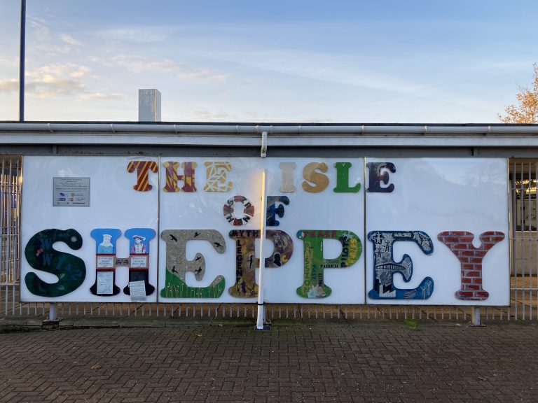 A large colourful mural which reads "The Isle of Sheppey"