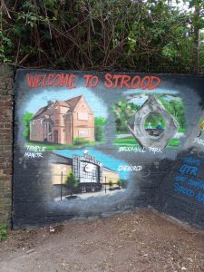 A mural depicting attractions and amenities near Strood station. Temple Manor, a medieval manor house; a sculpture in Broom Hill Park, Strood retail park.