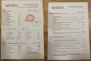 A menu listing a range of drinks, snacks and light meals