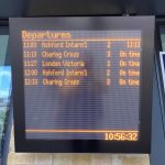 A digital displaying detailing departures, showing departure times, destinations, platform numbers and details of when the services are due. One service is running 11 minutes late, the remaining four are on time.