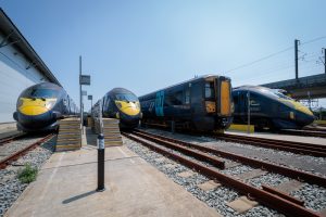 Three Southeastern Class 395 Javelin trains and a Class 375 train lined up in sidings at Ashford Maintenance depot