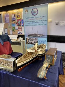 Model of the Medway Queen and promotional roller banner of the Medway Queen Preservation Society
