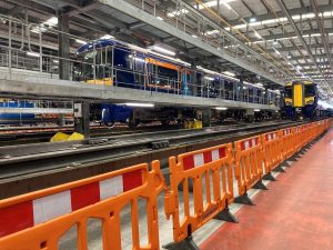 A view of electric trains in a maintenance depot