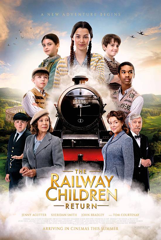 Promotional poster for "The Railway Children Return" featuring the cast around the front of a steam locomotive.