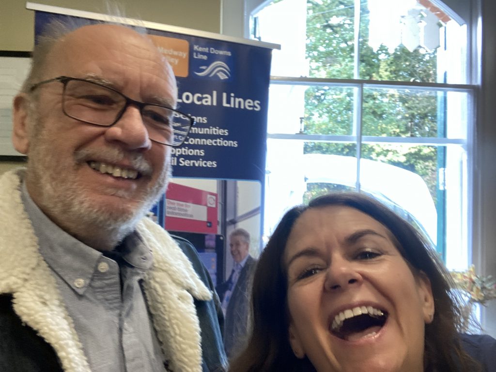 Chris and Therese, smiling and laughing at the Kent CRP promotional stall