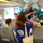 Students seated onboard the train