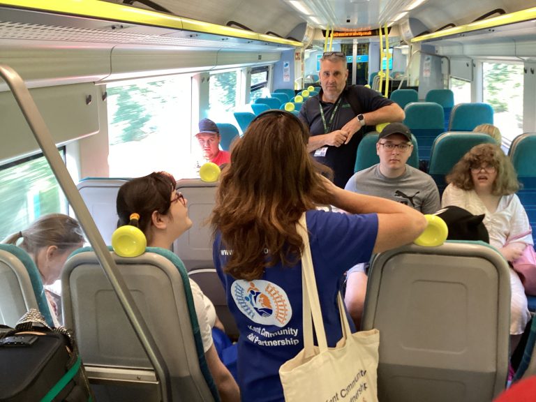 Students seated onboard the train