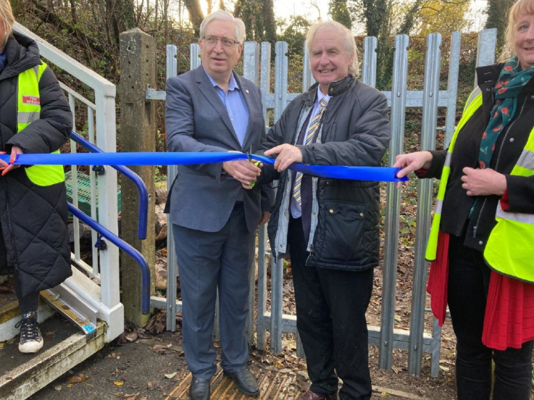 Chris and Clive cut the ribbon to open the nature garden