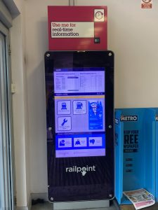 A large touch screen display of journey information