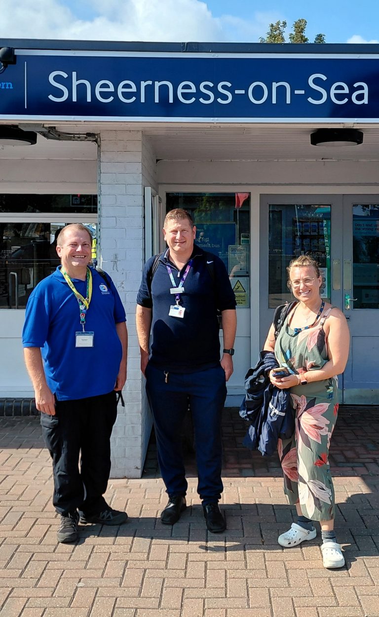 Gary, Luke and Karen pose for a picture outside Sheerness-on-Sea station.